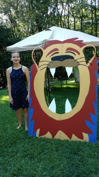 Elanor DeMan with her Carnival Lion bean bag toss game.