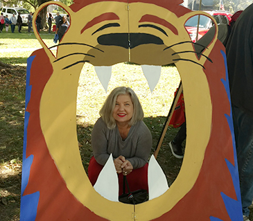 The City of Poughkeepsie Community Day in September where ThinkDIFFERENTLY and Dutchess County 100 Cups of Coffee collaborated to hear from the community. Pictured in the carnival lion is Cynthia Ruiz, retired Dutchess County Transit Administrator.