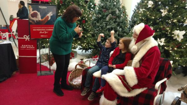 Galleria Mall hosted a Sensory Sensitive opportunity to visit with Santa Claus! Along with support from an American Sign Language (ASL) Interpreter from Mid-Hudson Interpreter Services (MHIS). The ASL interpreter will back to assist Santa again on Sunday 12/16/18 and 12/23/18 from 11 am to 1 pm. (December, 2018).