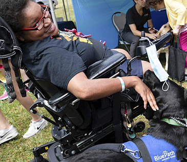 Guests received warm welcomes from Blue Path Service Dogs.