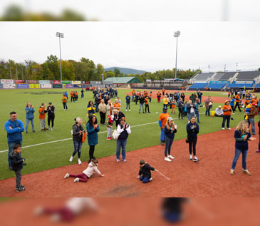 Down Syndrome Association of the Hudson Valley’s Buddy Walk 2022- Teams gathered on the midfield at the start of the day’s Buddy Walk listening to the Jason G’s opening remarks, the national anthem, a special performance of “What a Wonderful World”, and DJ Eric spinning some tunes. 10/01/2022