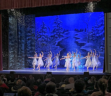 The New Paltz Ballet Company’s dancers (dressed in white dresses) on stage during the sensory friendly performance of The Nutcracker at the Bardavon. This performance was a partnership with Dutchess County Tourism, Art Mid-Hudson, the Bardavon 1869 Opera House and ThinkDIFFERENTLY. 12/9/22.