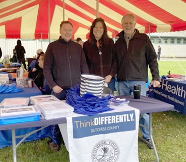 ThinkDIFFERENTLY Sponsored and was in attendance at the Autism Directory Services Walk for Autism on Saturday April 29, 2023. David McGorry, ThinkDIFFERENTLY Community Outreach; Sue Serino, and County Executive William FX O’Neil posed for a picture at the ThinkDIFFERENTLY table. Rain didn’t keep the walkers away on this day! April 2023