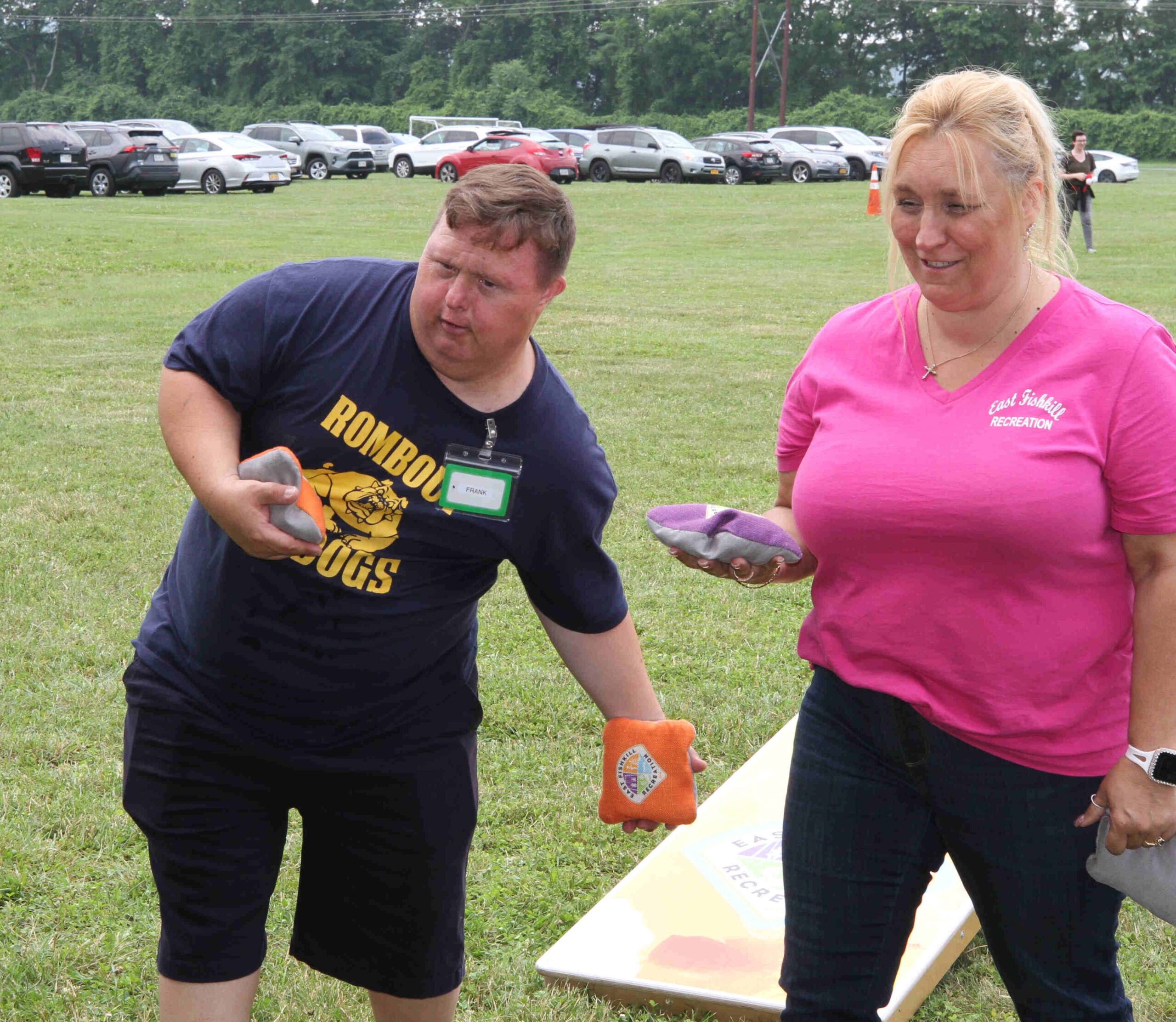One of our many vendors from the day was East Fishkill Recreation. Here Christine S from East Fishkill Recreation plays cornhole with an attendee at the 3rd Annual ThinkDIFFERENTLY Fitness & Field Day on Friday June 29, 2023 at Bowdoin Park.